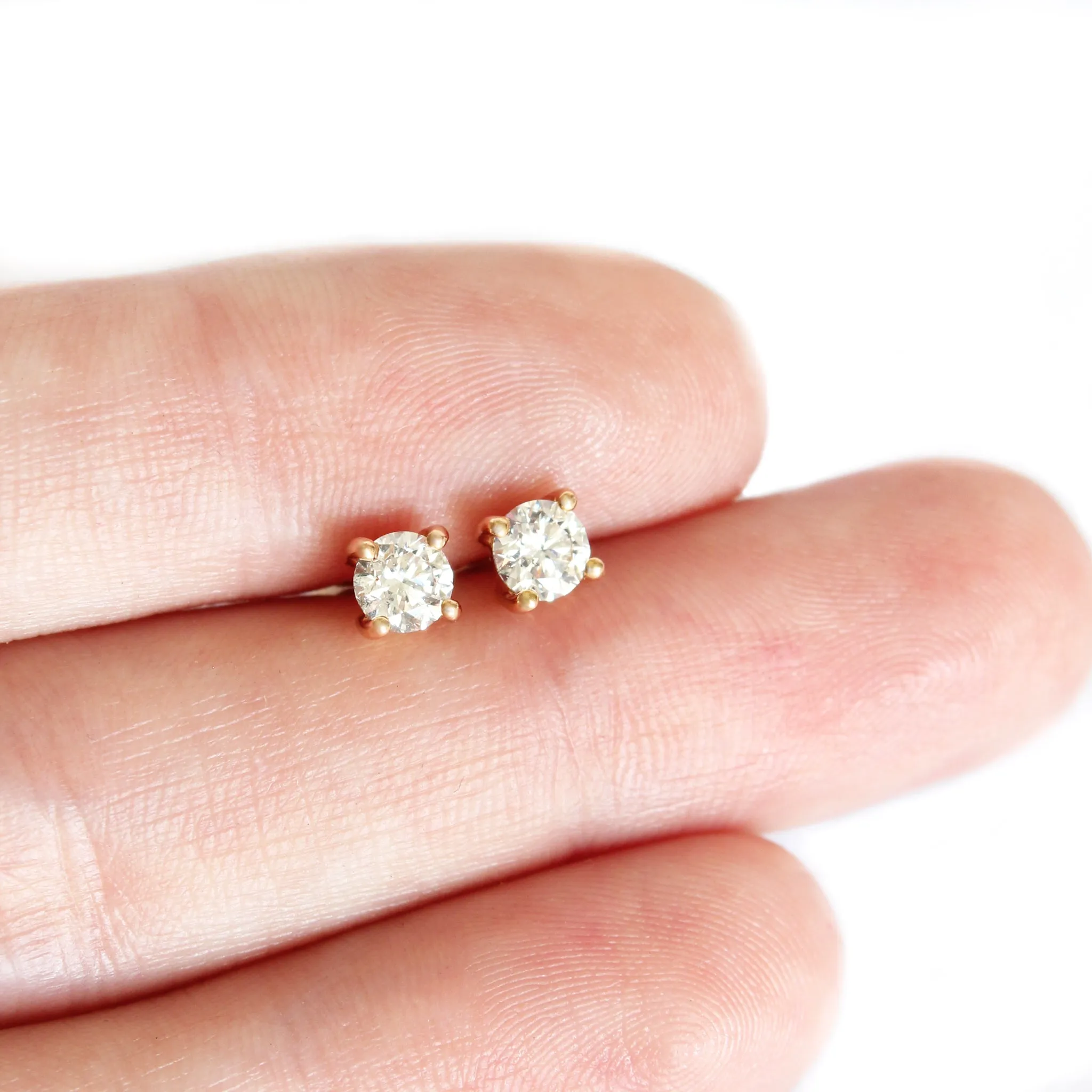 Classically Elegant White Diamond Rose Gold Studs