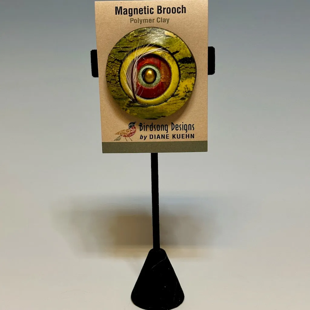 CONCENTRIC POLYMER CLAY MAGNETIC BROOCH WITH CULTURED PEARL CENTER AND FEATHER ACCENT  PCB656