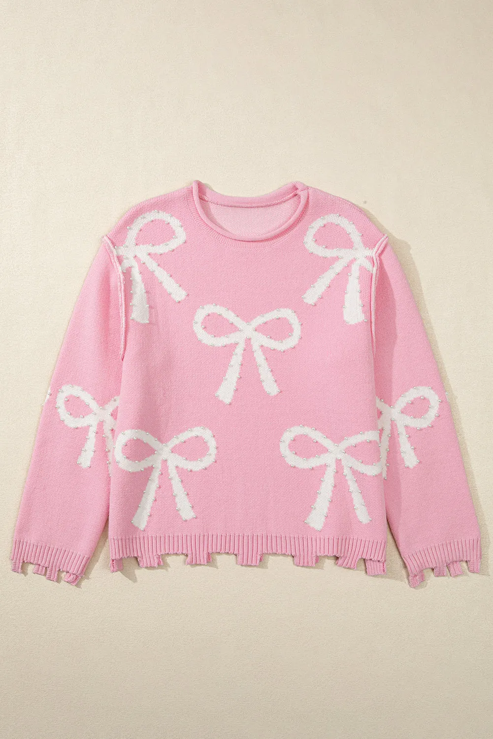 KaleaBoutique Pearl Beaded Bowknot Pattern Distressed Split Hem Sweater