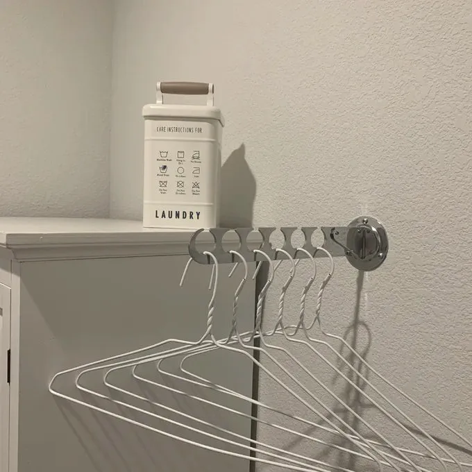 New Adjustable Laundry Room Organizer in Satin Nickel Finish! versatile hanger is great for hanging, garments to air dry in a laundry room to hold coats in a closet or mudroom, or to create additional hanging space in the closet