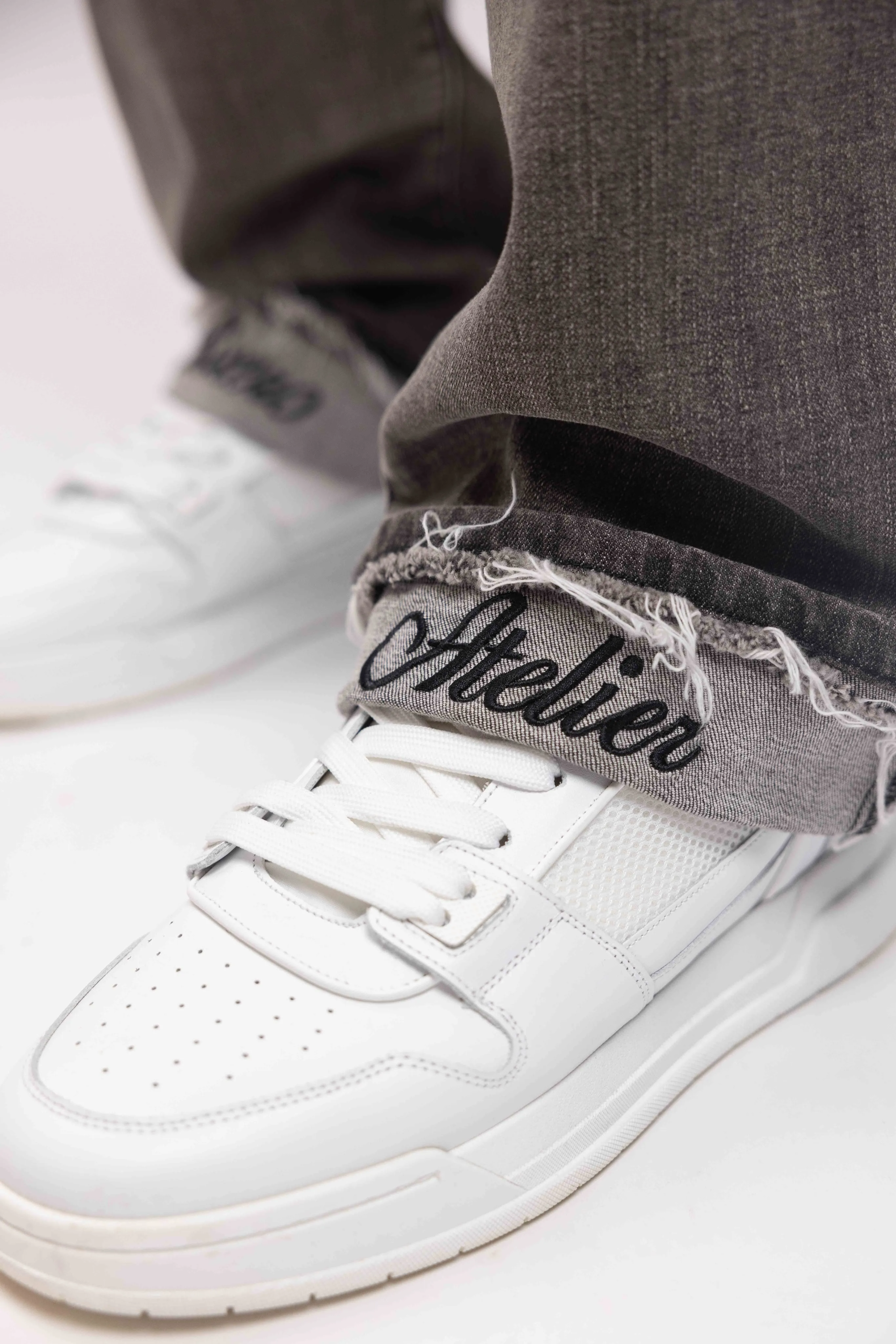 RELAXED FADED FOLD DENIM JEANS