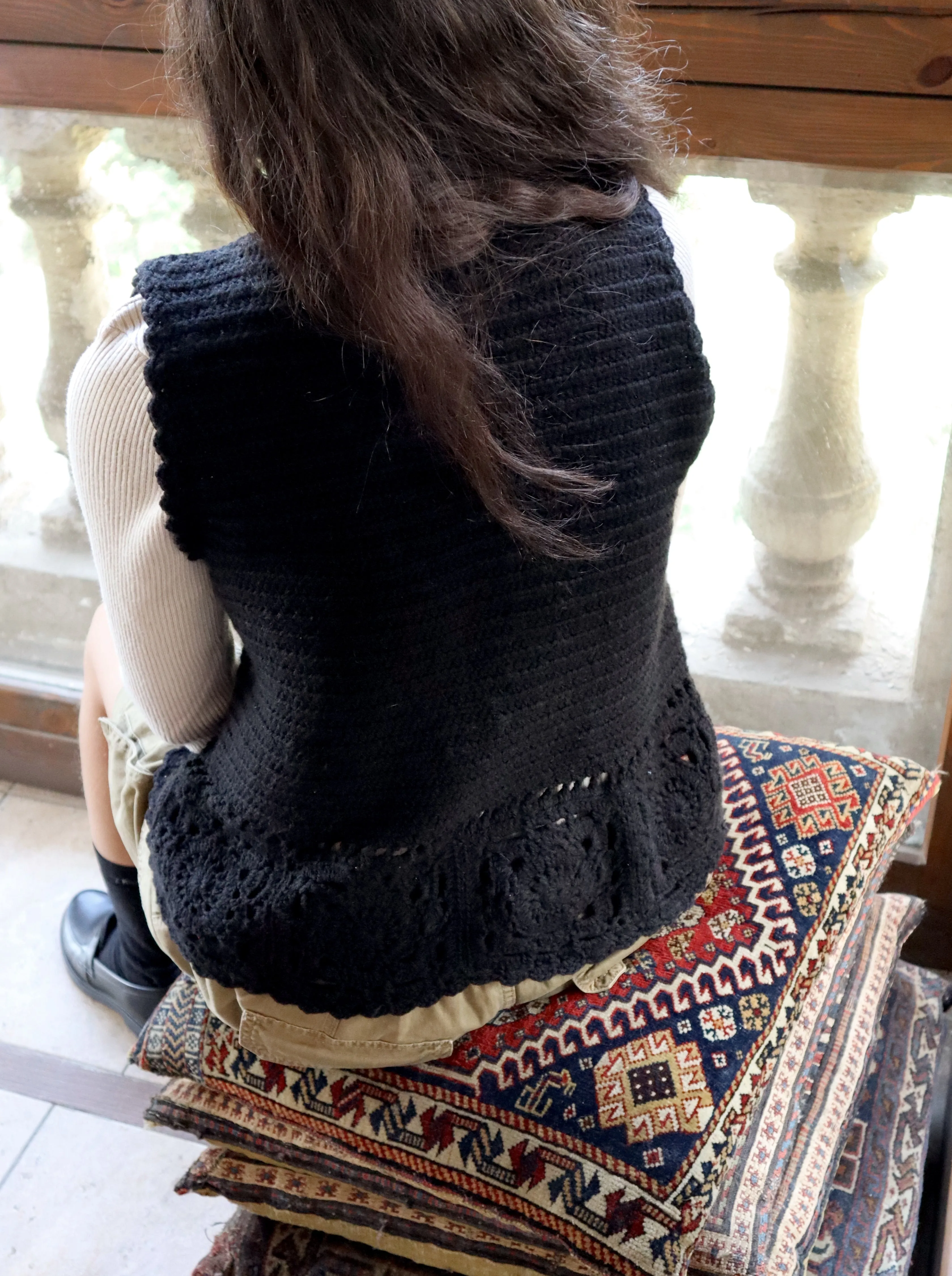 The Lady In Black Knitted Vest